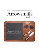 Personalised wood and slate cheese boards with family name design engraved.