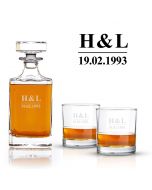 Wedding anniversary whiskey decanter gift set laser engraved with initials and date.
