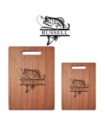 Solid wood chopping boards with personalised fishing design.