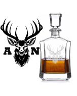 Wide body crystal whiskey and spirit decanters with engraved stag head design and initials.