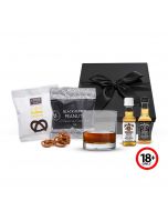 Whiskey miniatures gift set with nuts and pretzels.