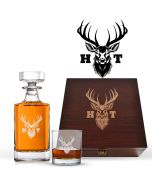 Luxury crystal decanter and glass box sets with engraved stag head design and initials.