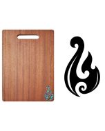 Hardwood chopping board engraved with a Maori tribal fishing hook design and genuine New Zealand Paua shell