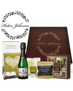 Luxury gourmet food and wine gift boxes with a green theme and engraved pine wood box.