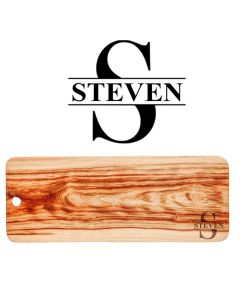 Wood grazer food serving boards engraved with a person's name and initial.