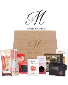 Luxury gourmet treat gift boxes for women filled with chocolates, sparkling wine and more.