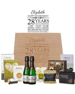 Gourmet treats and sparkling French wine retirement gift boxes with a personalised timeline design.
