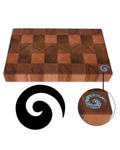 Reclaimed New Zealand Rimu wood chopping boards with NZ Paua shell inlay in the shape of a Koru symbol