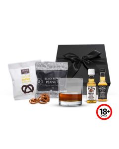 Whiskey miniatures gift set with nuts and pretzels.
