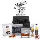 Whiskey gift boxes with engraved 30th birthday tumbler glass and snacks.