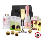 Indulgence gift pack with rose bubbles, chocolates and beauty products.