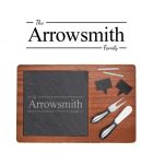 Personalised wood and slate cheese boards with family name design engraved.
