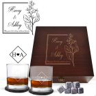 Personalised pine wood box with two tumbler glasses and accessories.