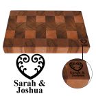 Reclaimed Rimu wood chopping boards engraved with a Koru and fern love heart symbol and couple's names