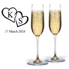 Personalised crystal Champagne flutes with entwined love hearts design, initials and date.