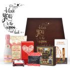 Personalised gourmet treat gift boxes for women with an I love you to the moon and back design engraved.