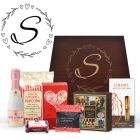 Personalised gift boxes for women with sparkling wine and gourmet treats