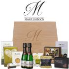 Luxury gourmet treat gift boxes with engraved initial and name design.