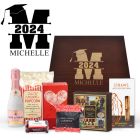 Personalised graduation gift boxes for women filled with gourmet treats, chocolates and sparkling French wine.