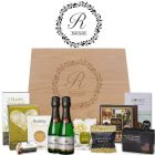 Gourmet treats luxury gift boxes with engraved floral circle with initial and name.