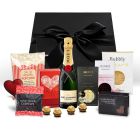 Luxury gift box with Champagne and gourmet treats.