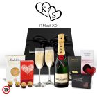 Moet Champagne and chocolates gift boxes with personalised love heart flutes.