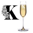 Crystal Champagne flute engraved with floral themed initials.