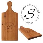 Rimu wood serving paddle platter boards engraved with leafy love hearts round board and initial