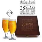 Personalised retirement gift boxes with engraved timeline design and two stemmed beer glasses