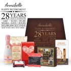 Luxury retirement gift box for women filled with gourmet treats.