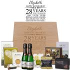 Gourmet treats and sparkling French wine retirement gift boxes with a personalised timeline design.