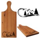 Rimu wood serving board paddle engraved with a hunting and fishing themed design.