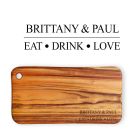 Personalised hardwood chopping boards engraved with eat drink love design and couple's names