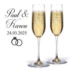 Personalised crystal Champagne flutes with wedding ring design.