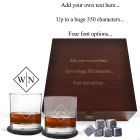 Whiskey glasses and accessories gift boxes with engraved text on the lid.
